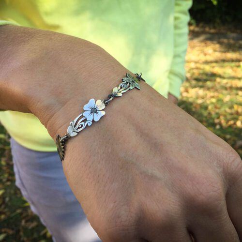 flower bracelet made from recycled sterling silver coins