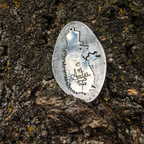 a hedgehog gathering, a selection of necklaces made from old silver coins