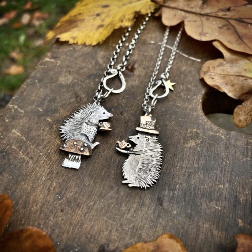 a hedgehog gathering, necklaces made from old silver coins