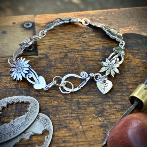 flower bracelet made from recycled sterling silver coins