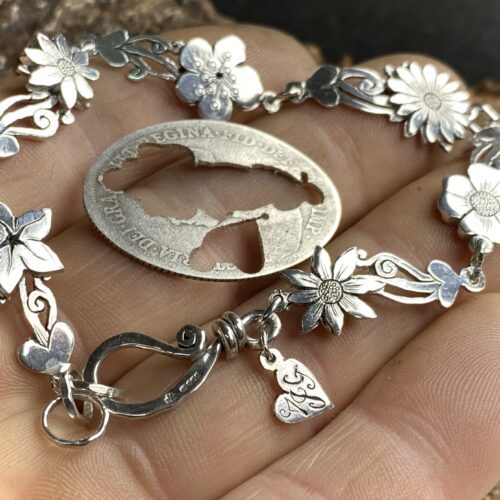 flower bracelet made from recycled sterling silver coins