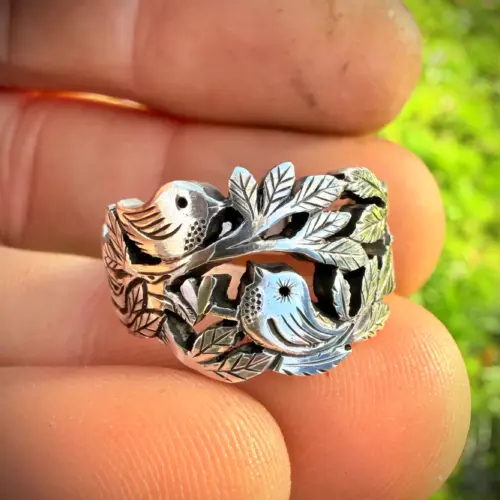 Lovebirds love birds ring made in Cambridge, England using recycled silver and traditional hand tools