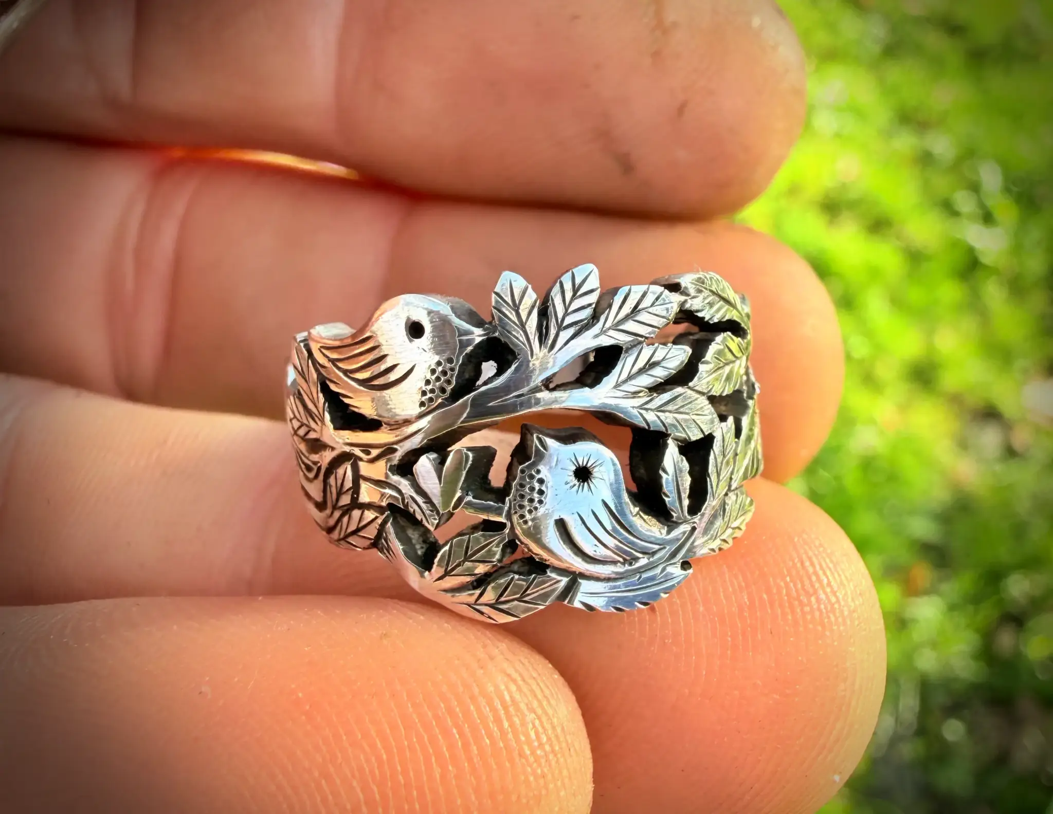 Lovebirds love birds ring made in Cambridge, England using recycled silver and traditional hand tools