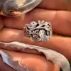 Lovebirds love birds ring made in Cambridge, England using recycled silver and traditional hand tools