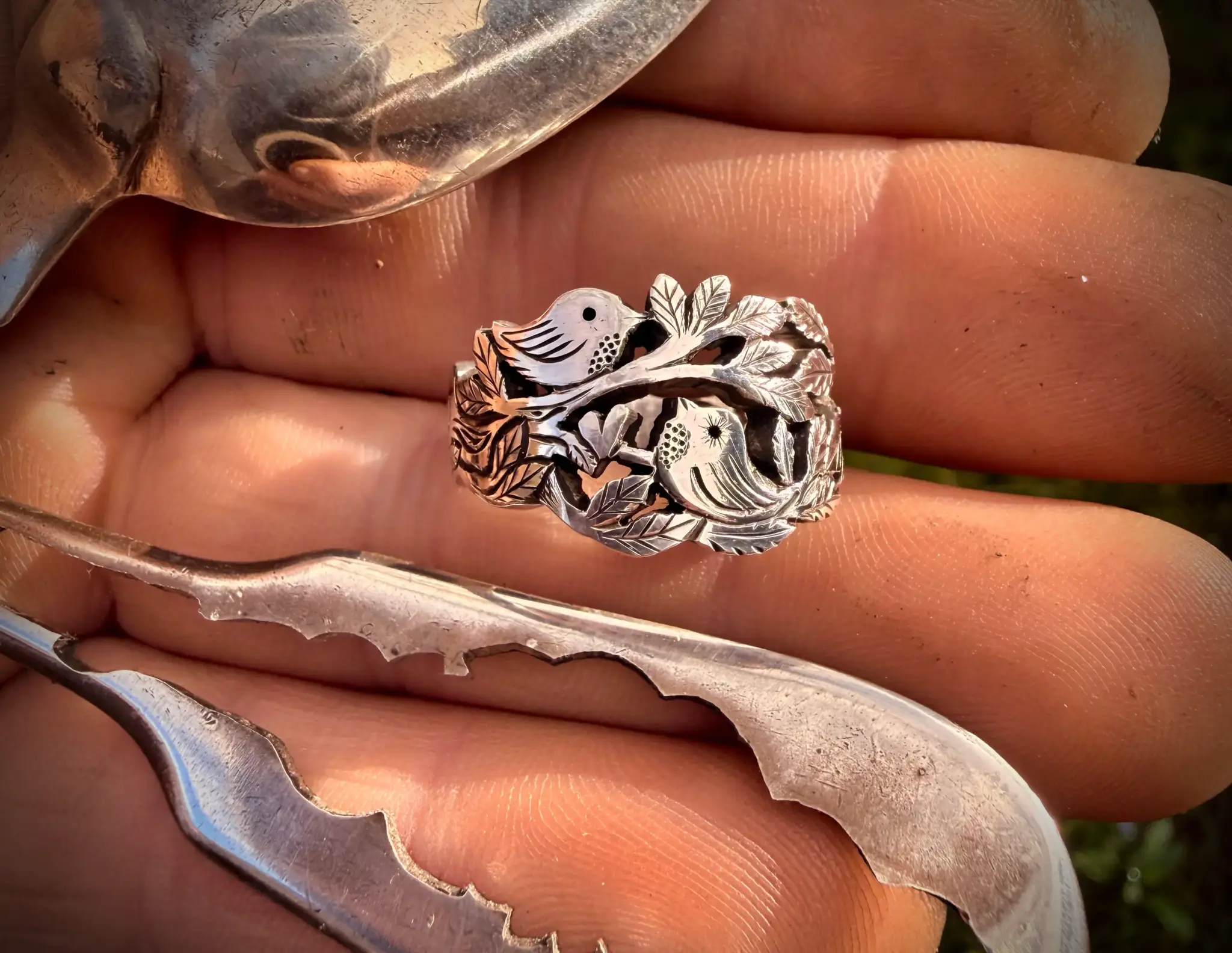 Lovebirds love birds ring made in Cambridge, England using recycled silver and traditional hand tools