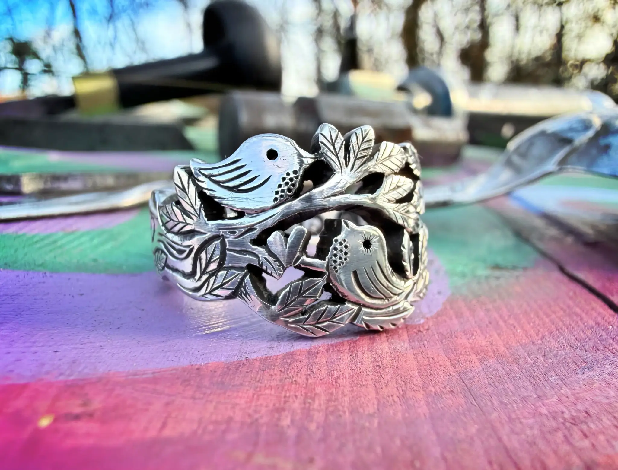 Lovebirds love birds ring made in Cambridge, England using recycled silver and traditional hand tools