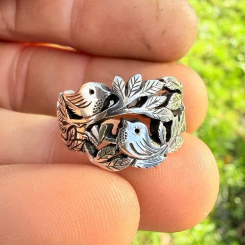 Lovebirds love birds ring made in Cambridge, England using recycled silver and traditional hand tools