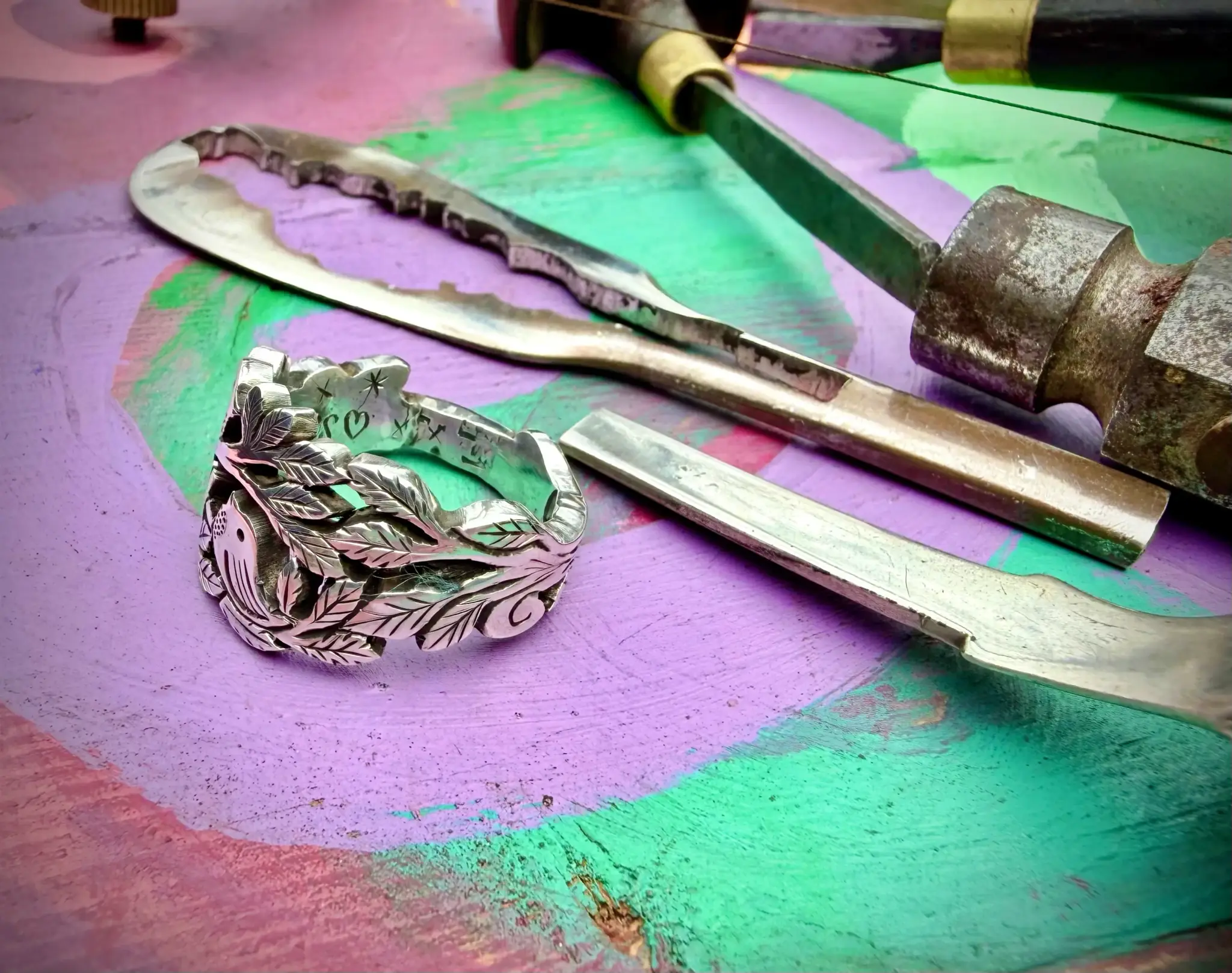 Lovebirds love birds ring made in Cambridge, England using recycled silver and traditional hand tools