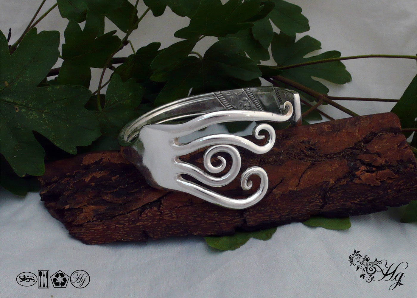 Handcrafted and recycled braking waves fork bangle