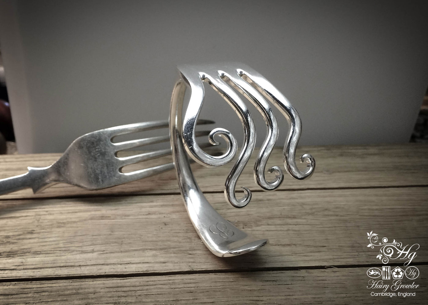 Handcrafted and recycled silver waves bangle