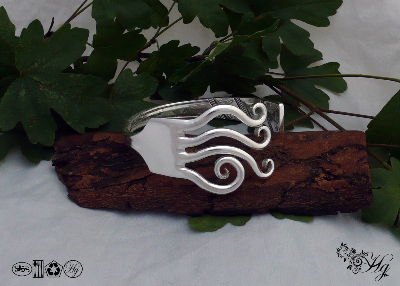 Handcrafted and recycled silver waves bangle