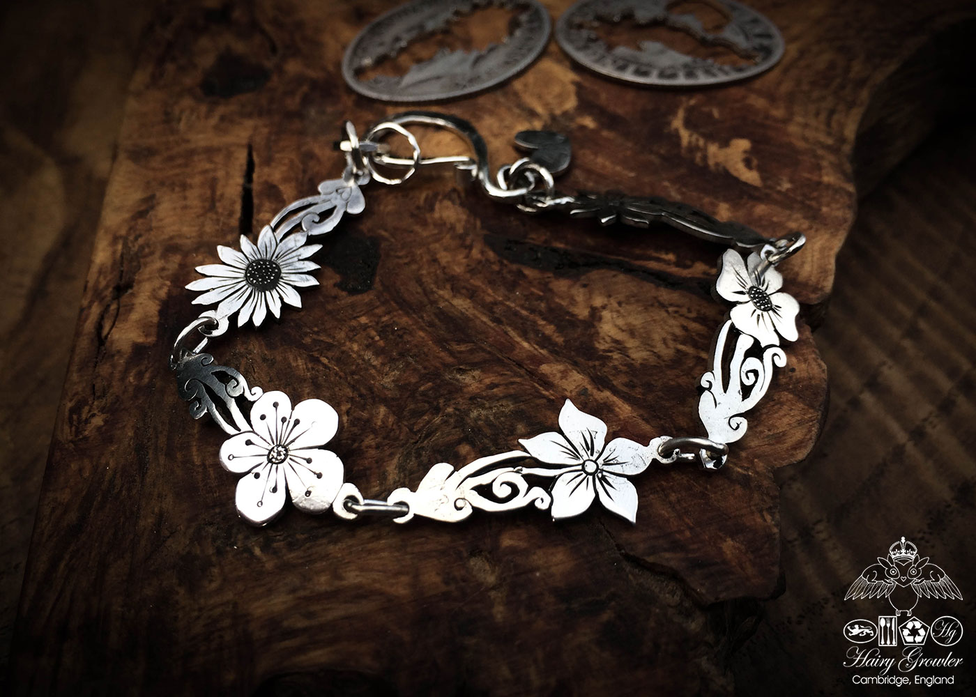 Wild flower bracelet made from recycled sterling silver coins