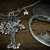 Handmade and repurposed silver woodland tree with owl sitting in the branches