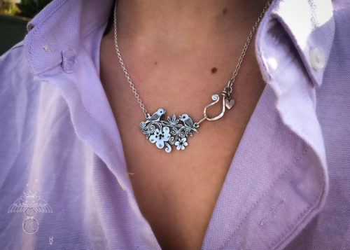 Cute bird necklace - handmade, ethical and recycled from silver shillings.