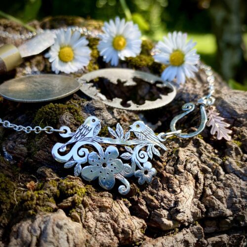 Cute bird necklace - handmade, ethical and recycled from silver shillings.
