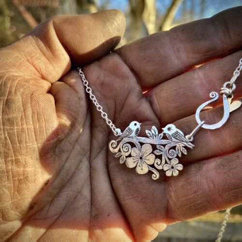 Cute bird necklace - handmade, ethical and recycled from silver shillings.