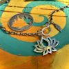 sacred lotus flower coin necklace handmade and ethical jewellery made in England