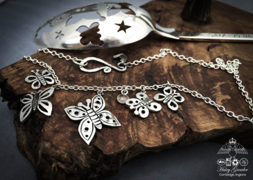 Butterfly necklace handcrafted and recycled from an antique silver spoon