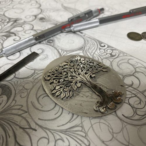 big silver tree necklace made from silver crown coin