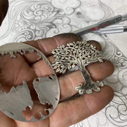 big silver tree necklace made from silver crown coin