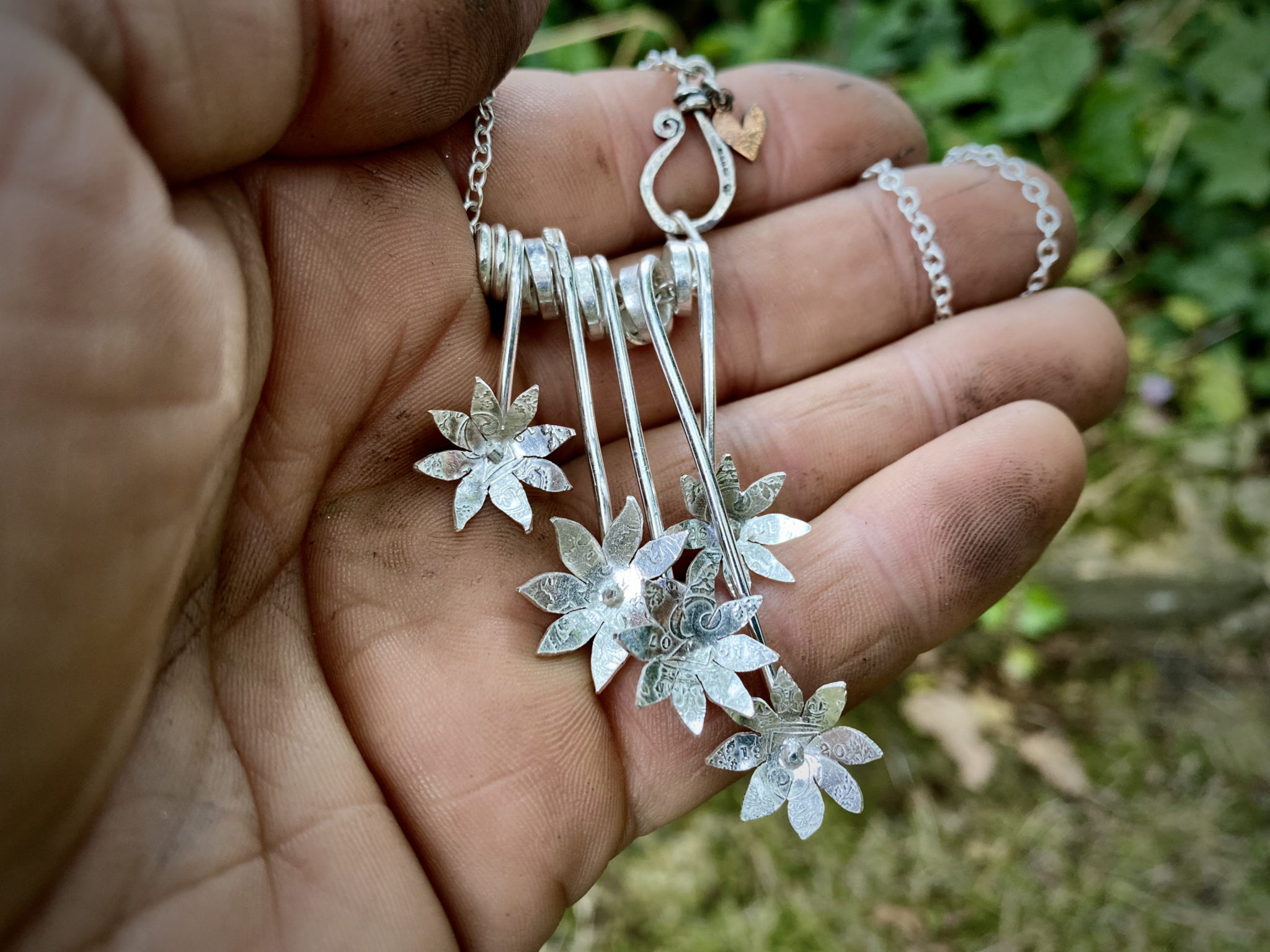 flowers made from silver coins