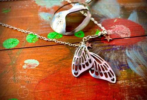 butterfly wings necklace individually hand cut and carved from an old undated but beautiful vintage spoon. Completely unique