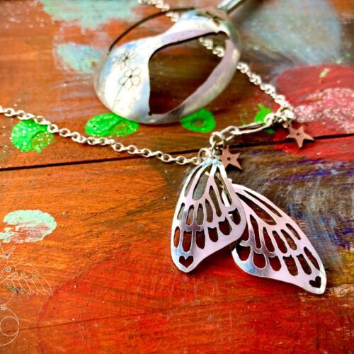 butterfly wings necklace individually hand cut and carved from an old undated but beautiful vintage spoon. Completely unique