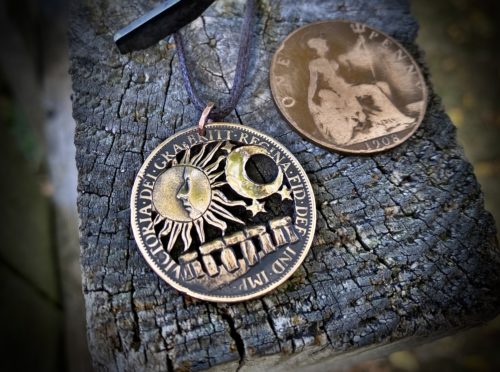 Stonehenge summer solstice coin pendant hand cut and carved in Cambridge, England by Hairy Growler