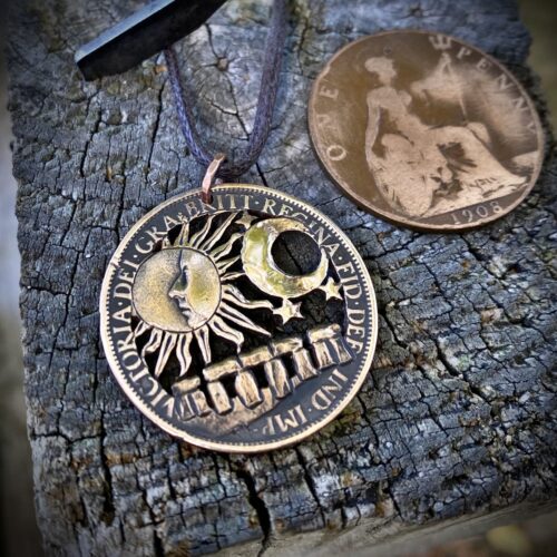 Stonehenge summer solstice coin pendant hand cut and carved in Cambridge, England by Hairy Growler