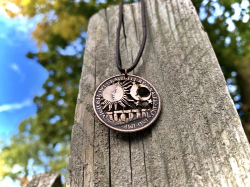 Stonehenge summer solstice coin pendant hand cut and carved in Cambridge, England by Hairy Growler