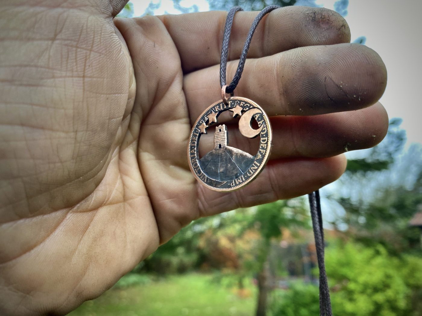 Handmade and repurposed Glastonbury Tor coin pendant necklace