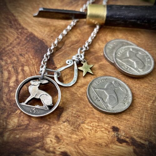 Irish hare coin jewellery. Hand-cut and carved Irish hare threepence coin pendant