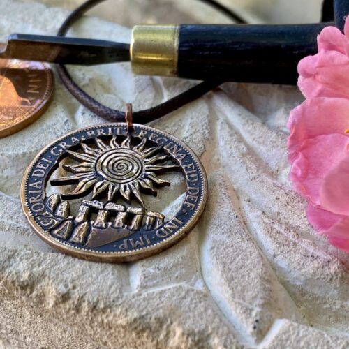 Stonehenge summer solstice coin pendant hand cut and carved in Cambridge, England by Hairy Growler