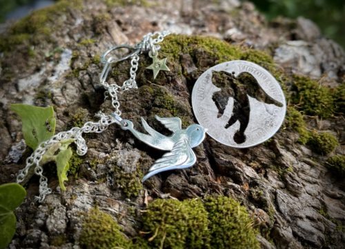 handcrafted and recycled silver coin swallow necklace pendant