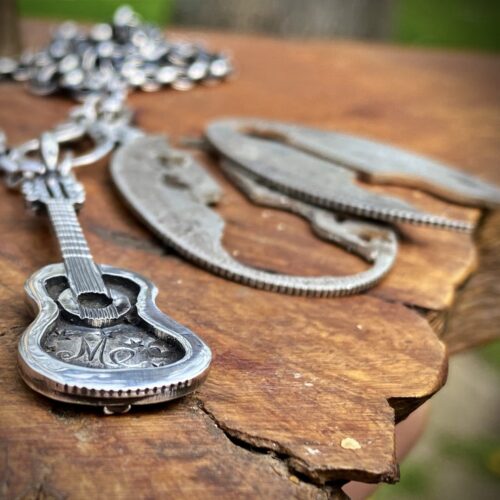 acoustic guitar necklace - handmade and recycled using silver coins