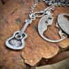acoustic guitar necklace - handcrafted, custom made and recycled using silver coins