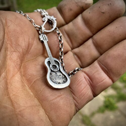 acoustic guitar necklace - handcrafted, custom made and recycled using silver coins