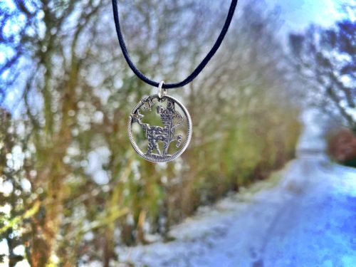 Handcrafted and recycled Bambi pendant necklace made from a repurposed coin