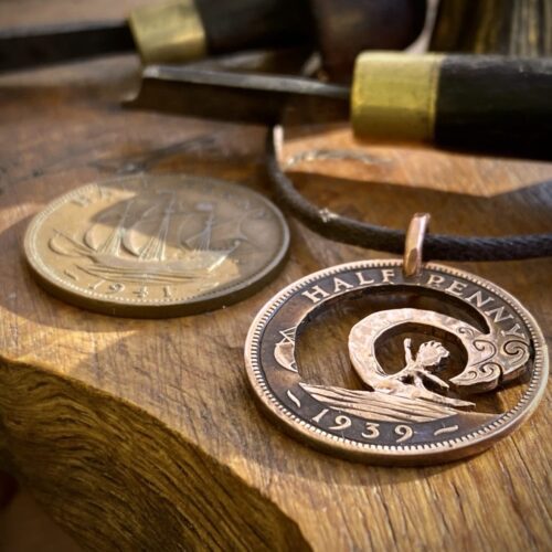 Handcrafted and recycled big wave surfer coin pendant necklace