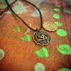 Handcrafted and recycled om coin pendant necklace