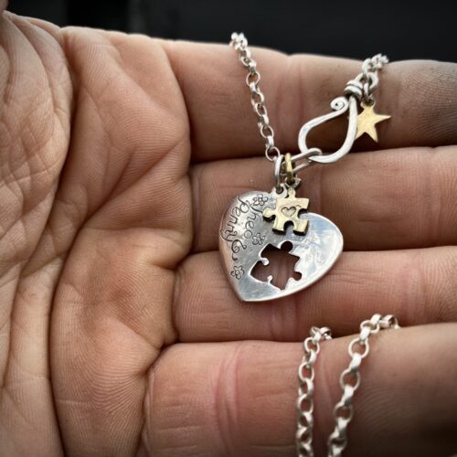 handmade and recycled silver coin love heart jigsaw necklace pendant