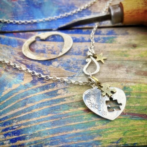 handmade and recycled silver coin love heart jigsaw necklace pendant
