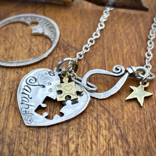 handmade and recycled silver coin love heart jigsaw necklace pendant