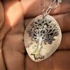 Handmade and repurposed silver Summer tree and tweeting birds made from a silver coin