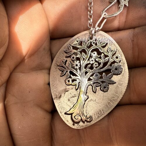 Handmade and repurposed silver Summer tree and tweeting birds made from a silver coin