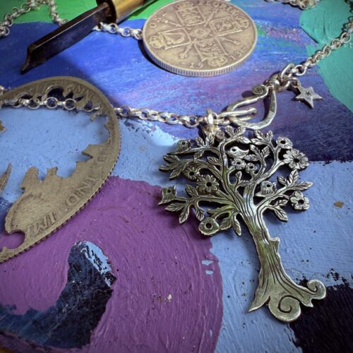 Handmade and repurposed silver Summer tree and tweeting birds made from a silver coin