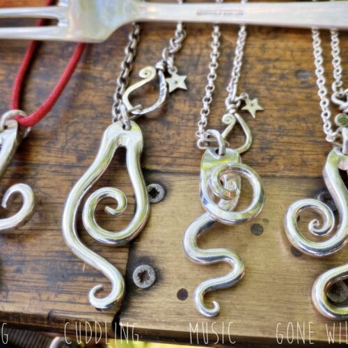 Handcrafted and recycled antique cake fork necklace