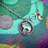 Irish hare coin jewellery. Hand-cut and carved Irish hare threepence coin pendant