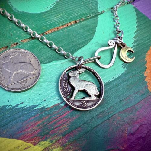 Irish hare coin jewellery. Hand-cut and carved Irish hare threepence coin pendant