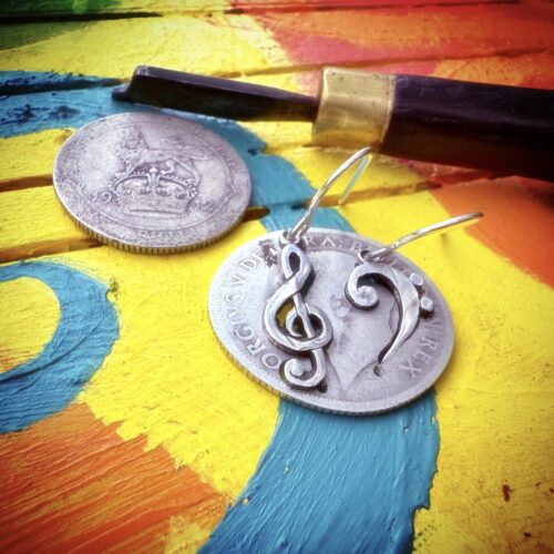 handcrafted bass and treble clef silver earrings made from upcycled silver coins